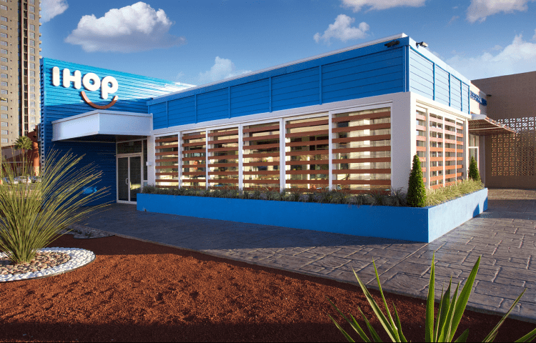 Ihop franchise building exterior shot with landscaping in foreground